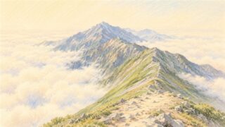 雲海の上に出た夏の山の稜線と山頂